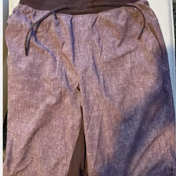 FOUR PAIRS OF VINTAGE LIMITED EDITION LULULEMON PACEBREAKER 9" ATHLETIC SHORTS